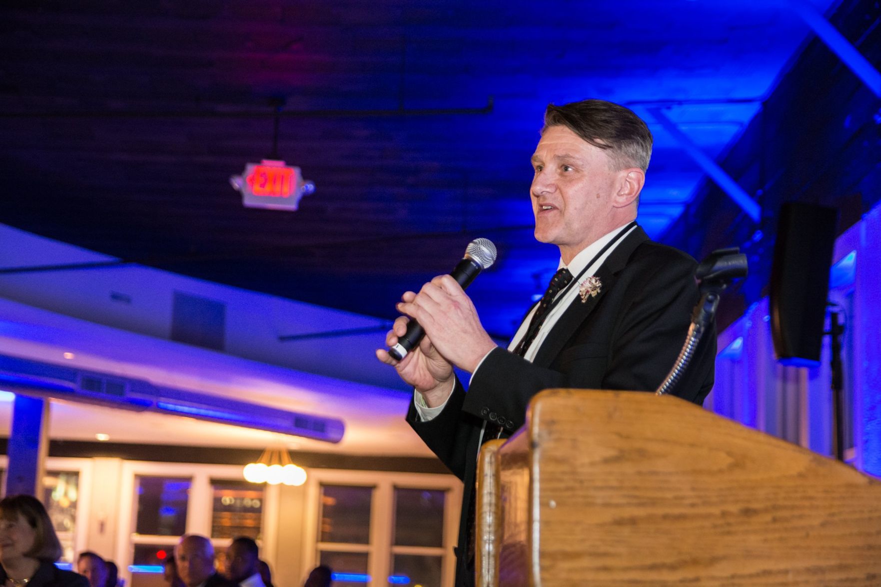 Jim Kemp conducts the fundraising section of the evening